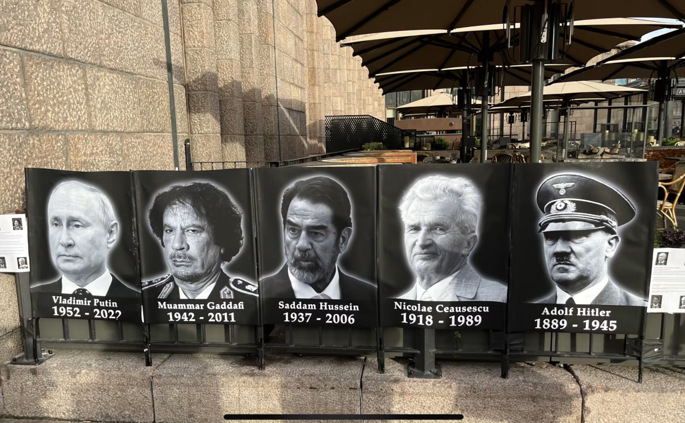 «Продолжительность жизни диктатора 70 лет»: на юбилей Путина в Хельсинки установили плакаты
