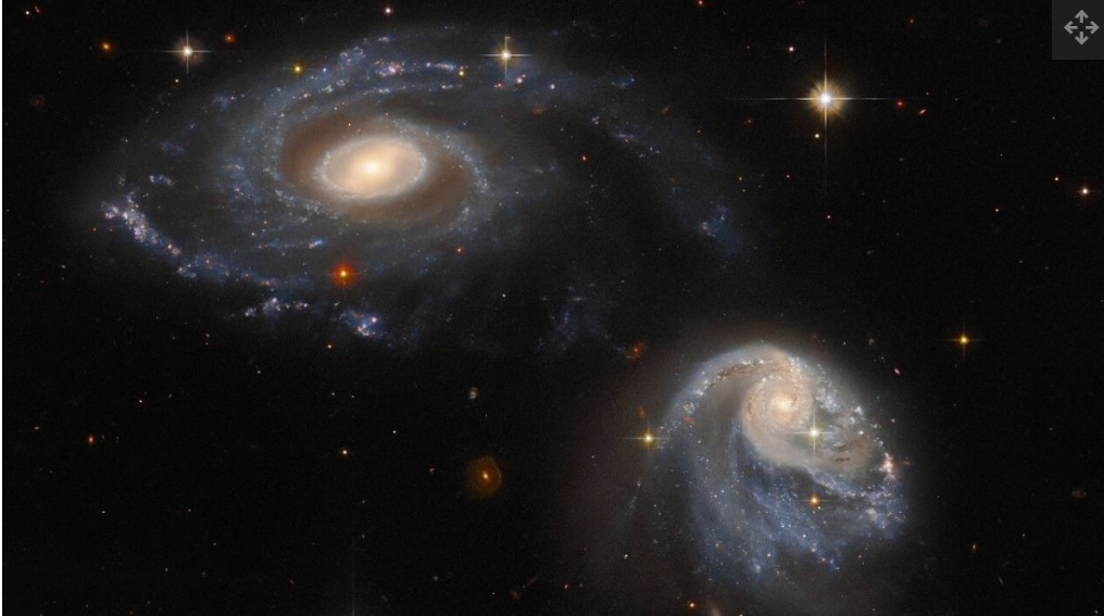 Телескоп «Хаббл» сфотографировал космический «танец» двух галактик