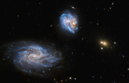 Телескоп Hubble показав дві галактики, які посилюють зореутворення одна одної